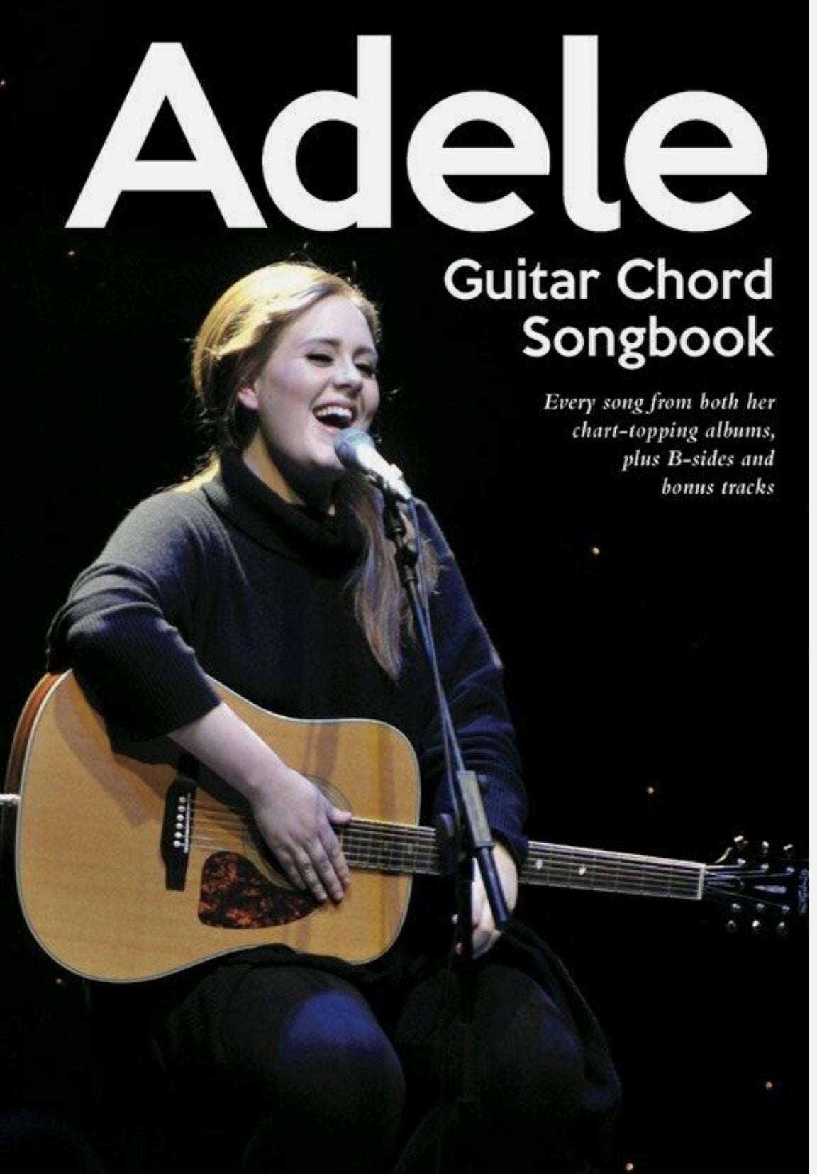 Guitar tuition book with audio, video, and multi-genre songs