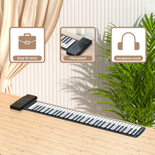 Cargar imagen en el visor de la galería, Child playing Konix roll up piano with built-in speaker



