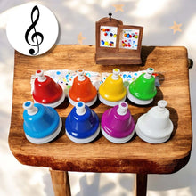 Charger l&#39;image dans la galerie, Chime Bells-8 Note Hand Bells Chime Set on wooden surface, featuring vibrant colors in C major scale, ideal for musical creativity.
