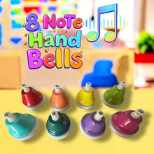 Cargar imagen en el visor de la galería, 8 Note Hand Bells Chime Set in vibrant colors on a table with a musical note background.

Musical bell set for classroom and therapy use


