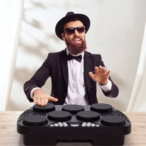 Playing the Konix drum set on a desktop


