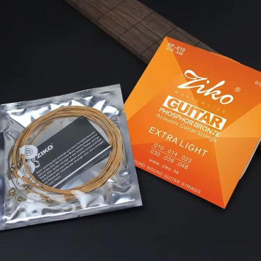 Pack of extra light classical guitar strings with ball end
