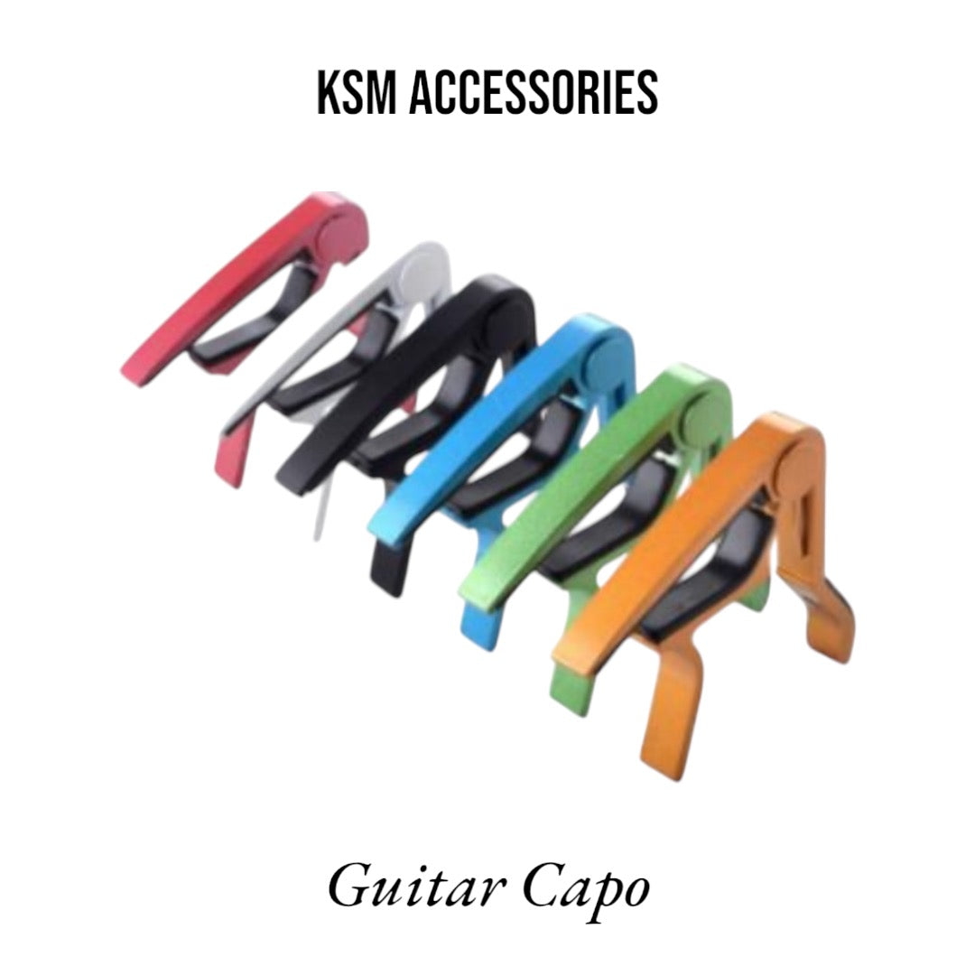 Quick-change guitar capo on acoustic guitar neck
