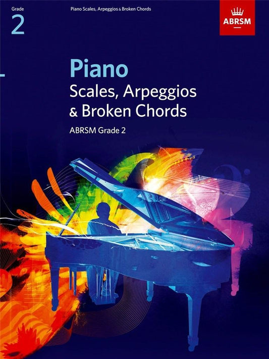 Blue and orange cover of "PIANO SCALES, ARPEGGIOS & BROKEN CHORDS, GRADE 2" by ABRSM for piano exam preparation.